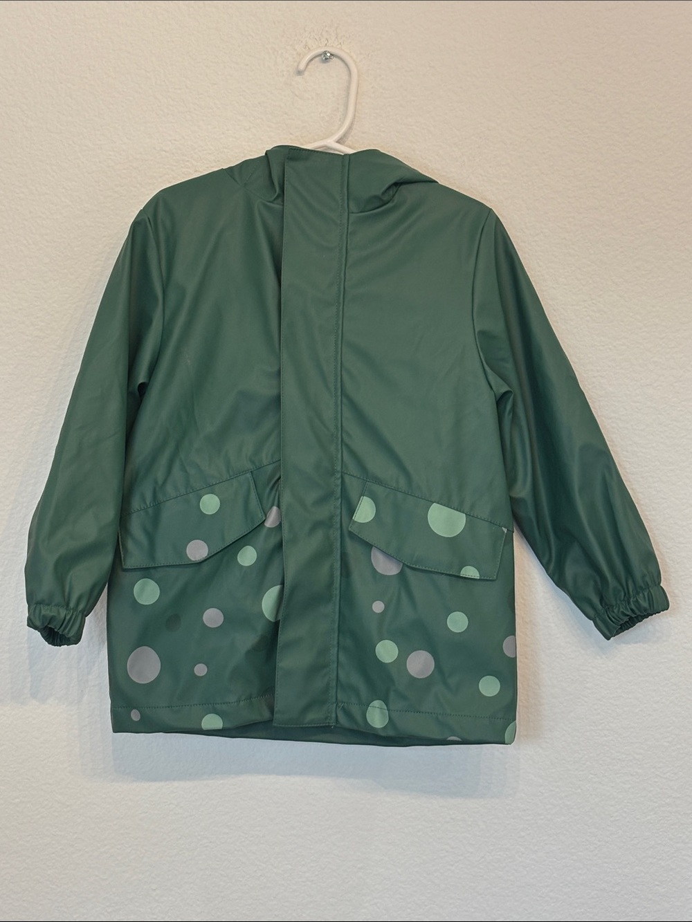 Kids' Dark Green Hooded Raincoat with Polka Dot Pockets and Dino spike hood